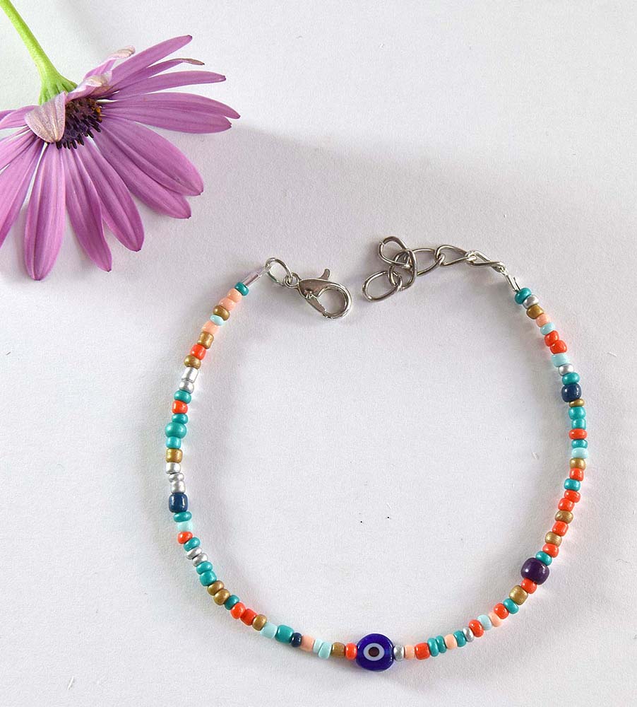 PULSERA OJO T C/MOSTACILLA 011