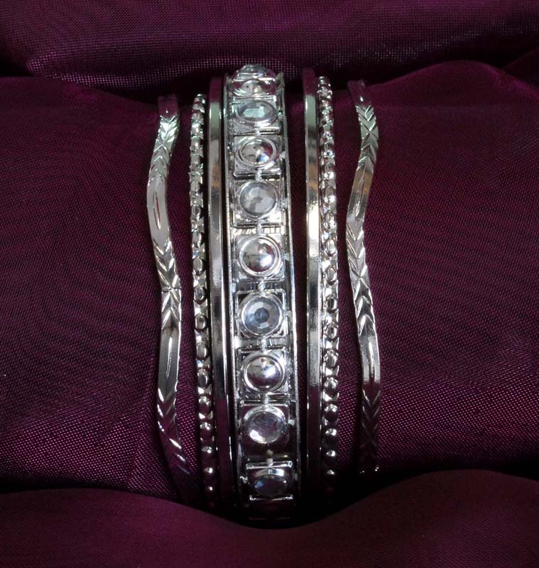 PULSERA MET 7 AROS 010